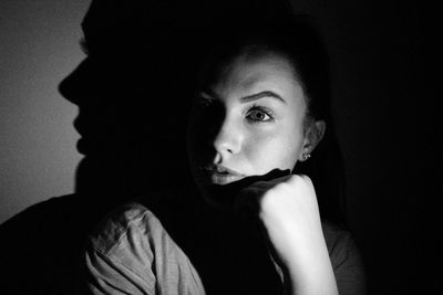 Portrait of young man looking away