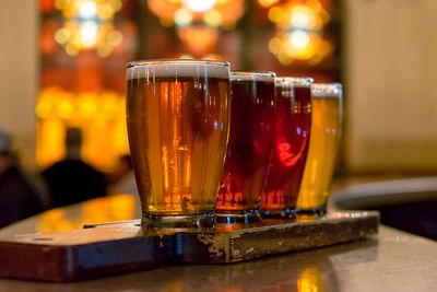 Close-up of beer glass on table