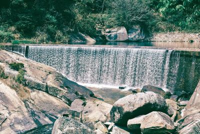 Stream flowing through rocks