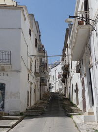 Narrow side street with steps, ostuni, puglia, italy 2022