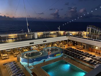 High angle view of swimming pool by sea against sky