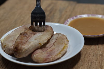 Close-up of breakfast served on table