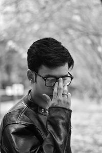 Portrait of young man wearing eyeglasses