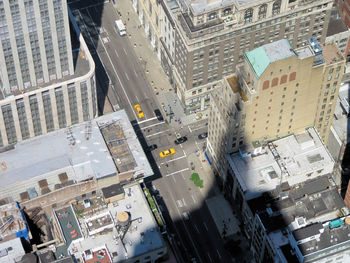 High angle view of street amidst buildings in city