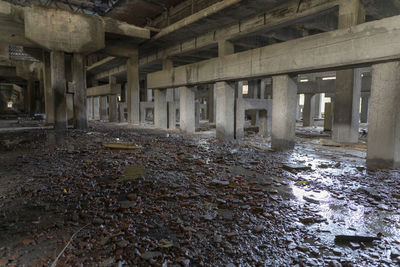 Abandoned building in puddle