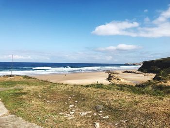 Scenic view of beach against sky