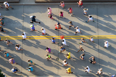 High angle view of people walking on street