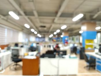 Blurred motion of illuminated lights on ceiling at night