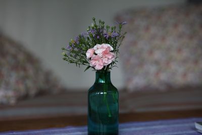 Flower vase on table