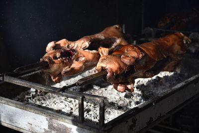 High angle view of meat on barbecue grill