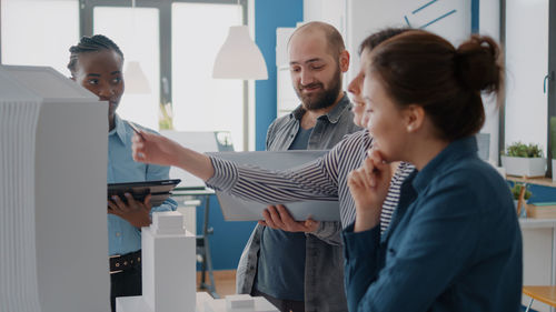 Business colleagues working in office