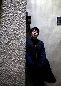 Portrait of mid adult man standing outdoors