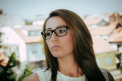 Close-up of young woman wearing eyeglasses
