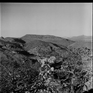 Scenic view of arid landscape against clear sky