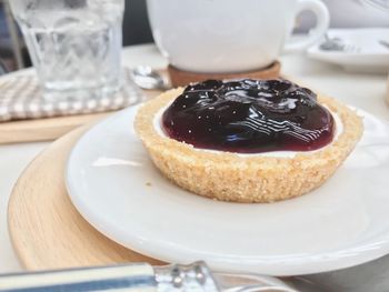 Close-up of cake served on table