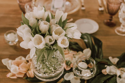 Elegant banquet with flowers under tent