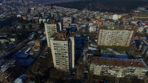 High angle view of city lit up at night