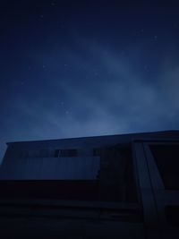 Low angle view of building against sky at night