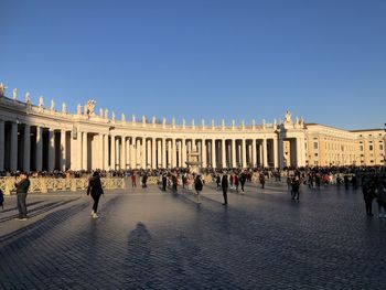 Group of people in front of historical building