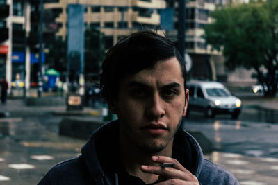 Close-up portrait of serious young man