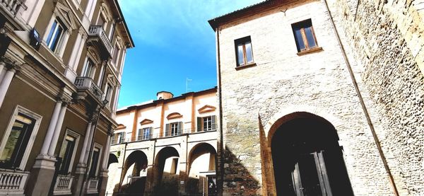 Low angle view of old building against sky