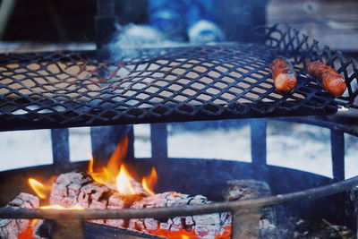 Close-up of meat on barbecue grill