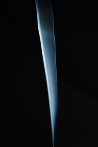 Close-up of smoke against black background