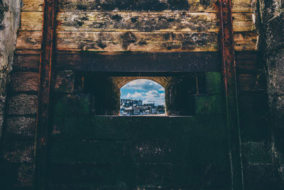 Historic building seen through arch