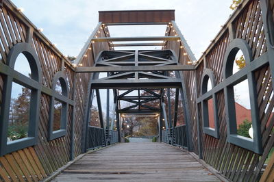 Footbridge against sky