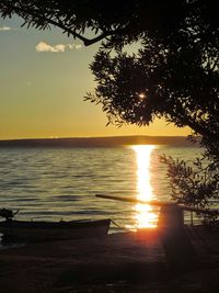 Scenic view of sea at sunset