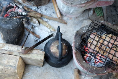 High angle view of food being prepared on wood burning stove