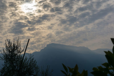 Low angle view of silhouette mountain against sky