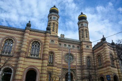 Low angle view of historical building against sky