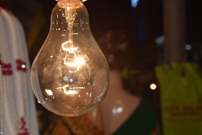 Close-up of illuminated light bulb