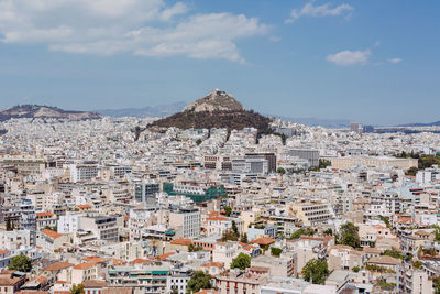 Aerial view of town against sky