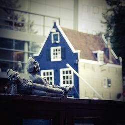 Statue on house window