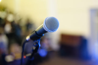 Close-up of microphone in auditorium