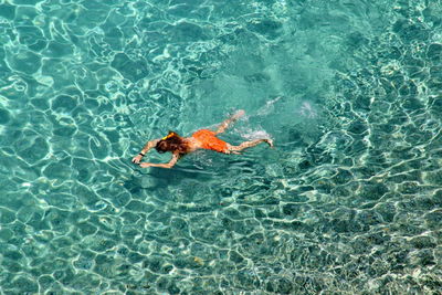 High angle view of person swimming in pool