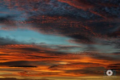 Scenic view of dramatic sky during sunset