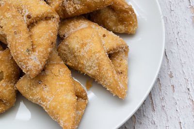 High angle view of cookies in plate on table
