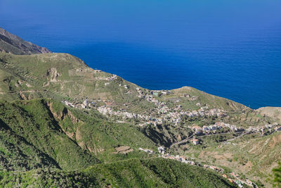 High angle view of sea and mountains