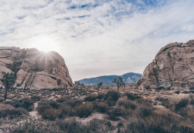 Panoramic view of rock formations against sky