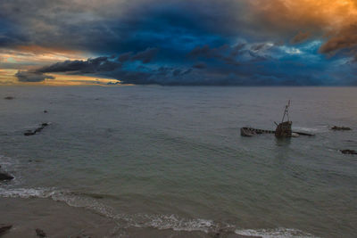 Scenic view of sea against sky during sunset