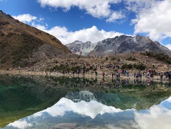 Reflection of mountains in lake against sky