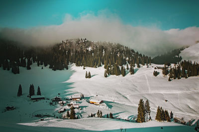 Scenic view of frozen lake against sky