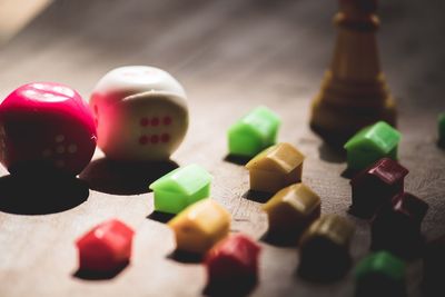 High angle view of multi colored candies on table