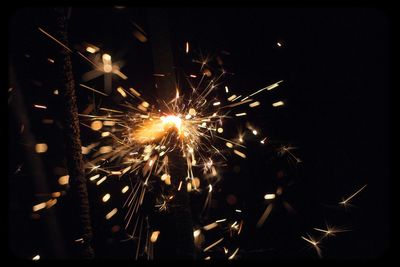 Firework display at night