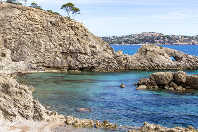 Rocky coast at peguera in the west of mallorca on a sunny day in spring