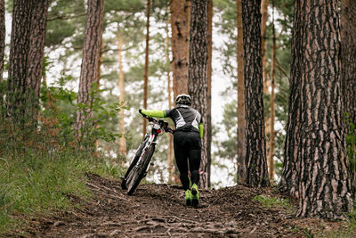 Full length of man in forest