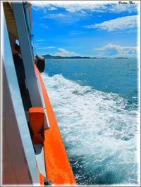 Cropped image of boat sailing in sea